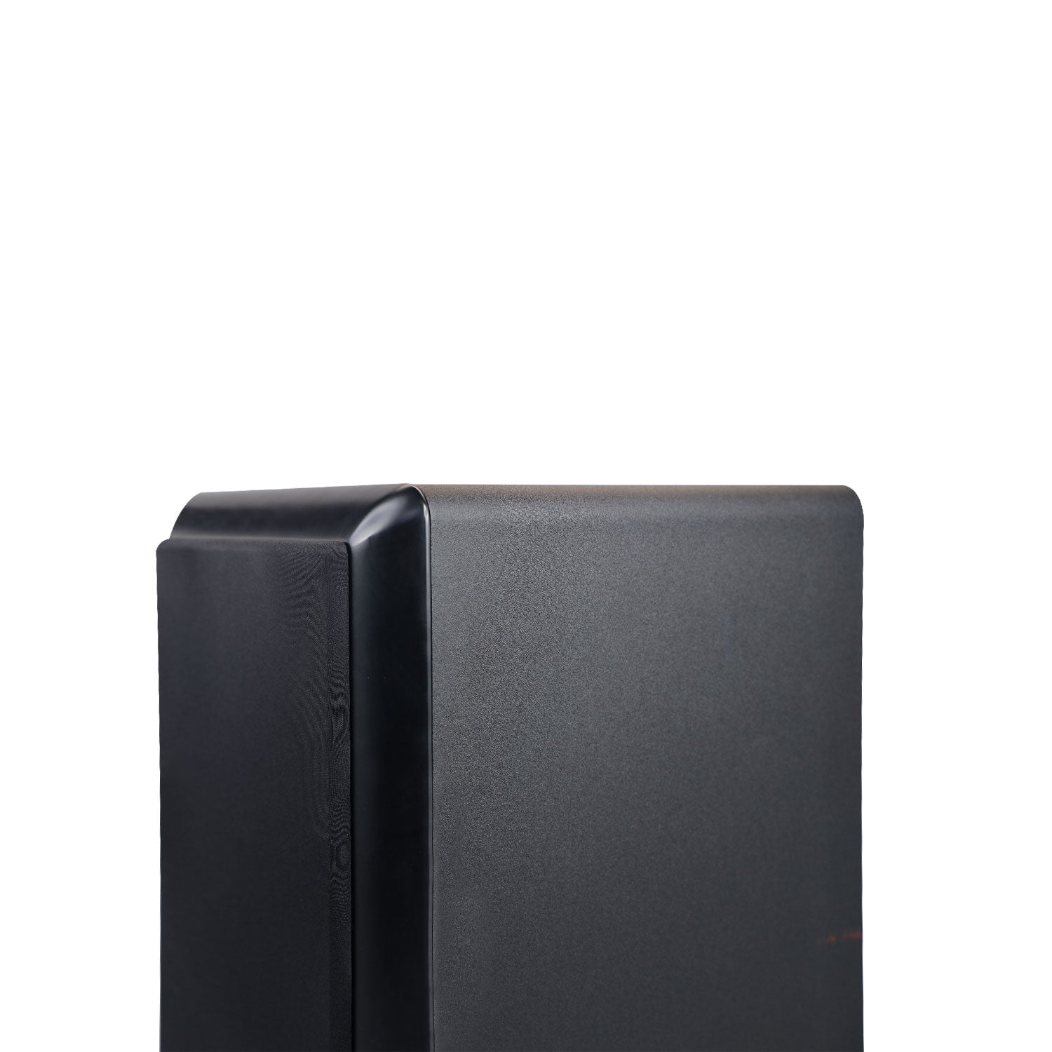 Close-up of the sleek, black VEGA4S Subwoofer with a matte finish on a white background, showcasing its top, part of the front and side. Its rectangular shape and subtle curves are enhanced by the VEGA Series 4