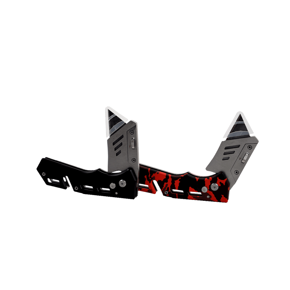 The Cerwin Vega Pocket Knife features futuristic angular blades and a sleek design. The left is primarily black, while the right boasts a striking red and black pattern. Both have metallic accents with geometric shapes and premium stainless steel blades positioned apart, facing upward.