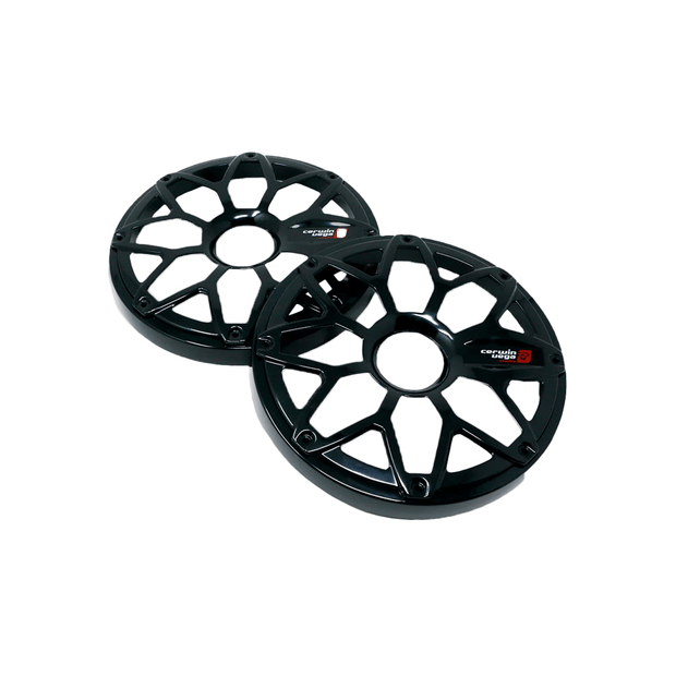 The RPM Stroker 8" speaker grills, sold as a pair, are black with a modern web-like design made of steel and powder-coated for durability. Each grill features a small red and white "croche" logo near the center and is positioned diagonally to stand out against a plain white background.