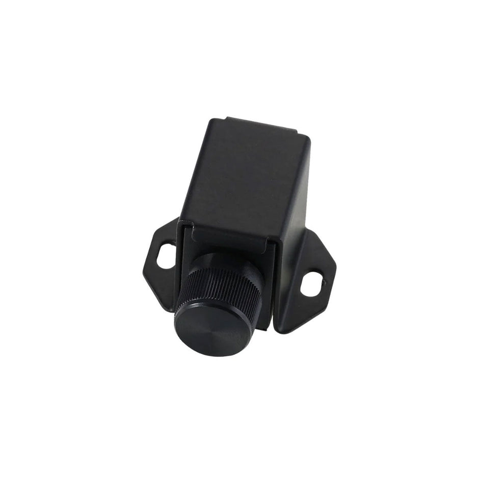 The Stealth Bomber Amplifier features a small black rectangular knob with a ribbed cylindrical surface on one side. It's attached to a base with flanged edges with holes for mounting, designed for manual adjustments, and is showcased on a plain white background.