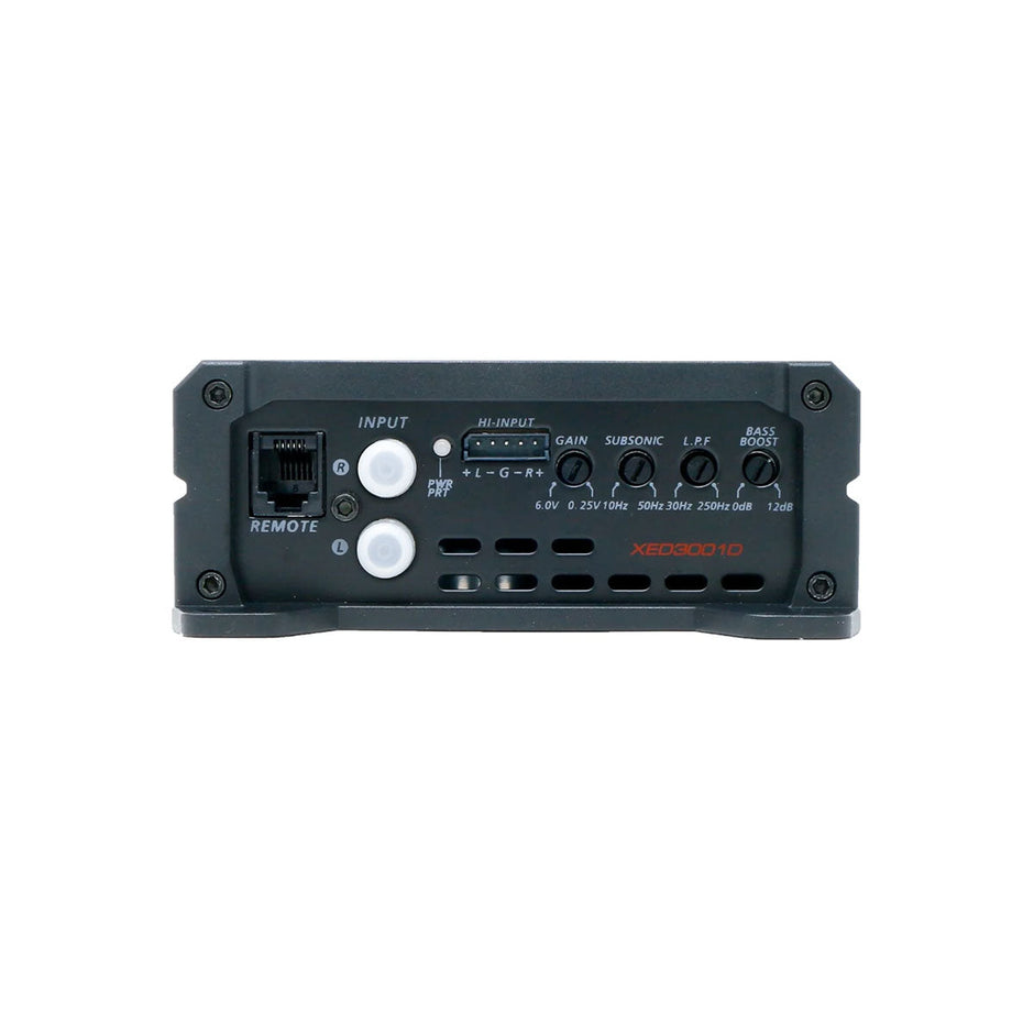 The black XED Series 1-Channel Mono Block Class-D Amplifier - XED3001D front view highlights a high-performance design with a remote input port, multiple dials for gain, subsonic, low frequency, and bass boost. A minimalist style features corner screws and bold 