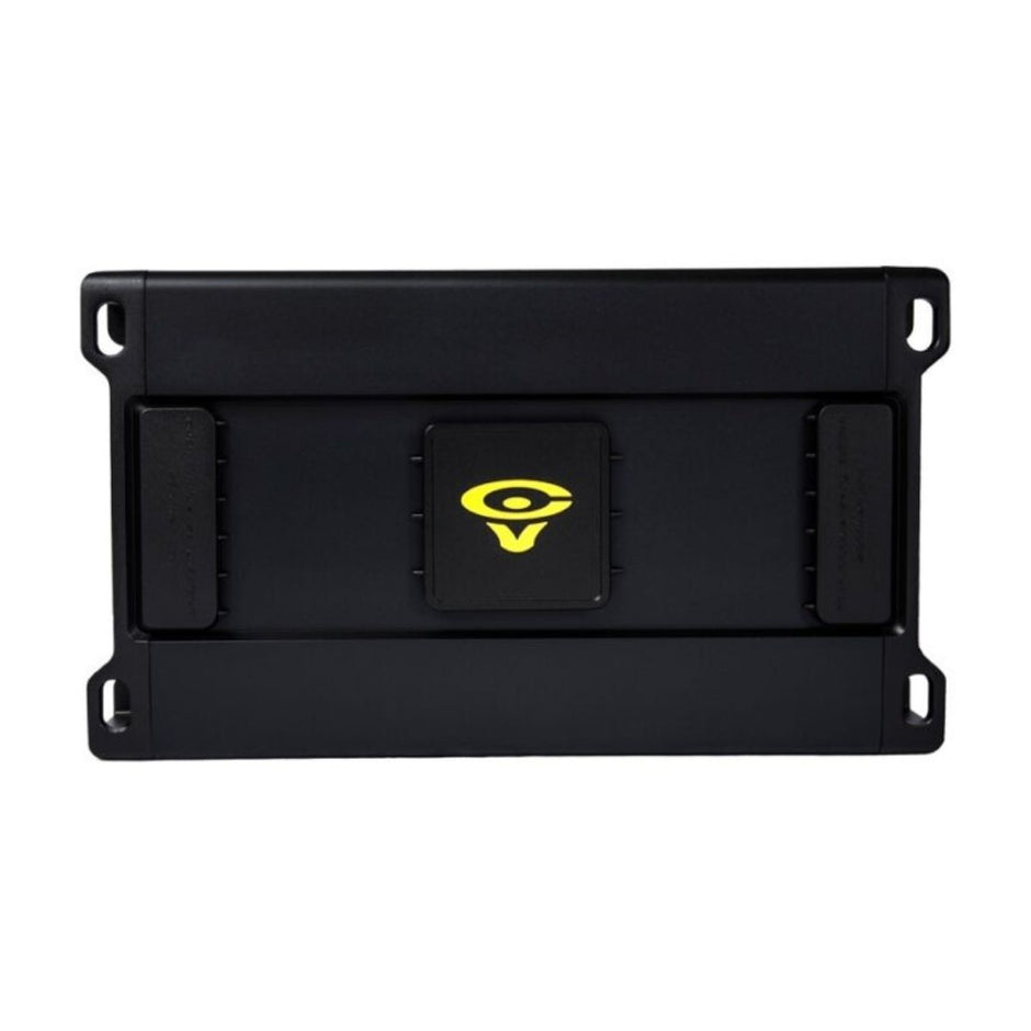 The image displays the sleek, modern Stroker Pro Amplifier, a rectangular black device with rounded edges and two side grips. A central insignia with a yellow eye-like symbol on a black background adds flair, while four corner holes offer easy mounting options.