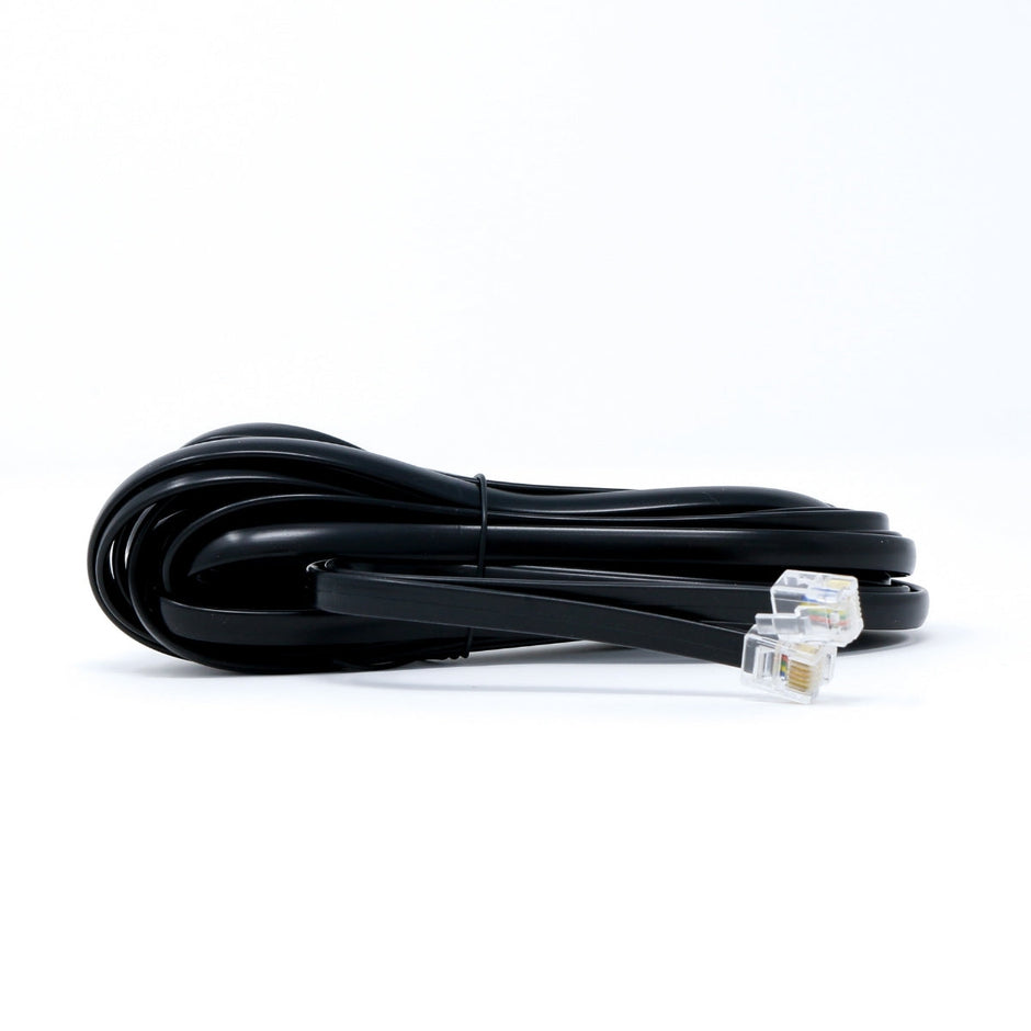 A coiled black telephone cable with an RJ11 connector against a white background is neatly looped and secured with a small black tie, similar to the engineering precision in Cerwin-Vega's CVP Series 1-Channel Class AB Amplifier - CVP2000.1D, highlighting the transparent connector with gold contacts.