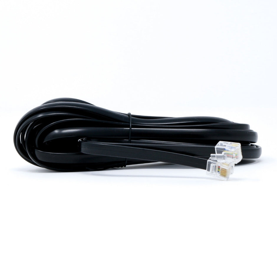 A coiled black telephone cable with RJ11 connectors on both ends, set against a plain white background, mirrors the precision of the Cerwin-Vega CVP2500.5D Amplifier’s bass control. The translucent connectors reveal internal wiring, akin to unveiling extreme bass power.