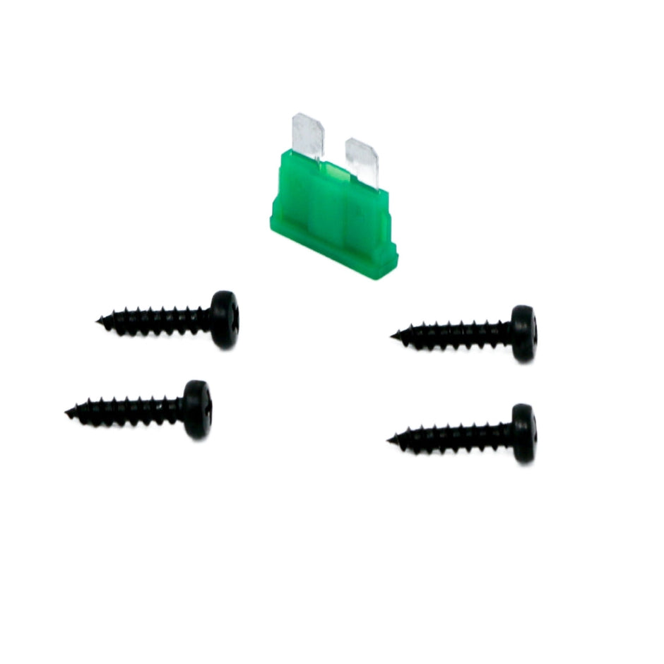 Four black screws, arranged in an inverted V-shape on a white background, point inward toward a green mini blade fuse with metal prongs. This precise arrangement mirrors the meticulous design of the Cerwin-Vega 2 Channel Bridgeable Class AB Amplifier - CVP800.2D.