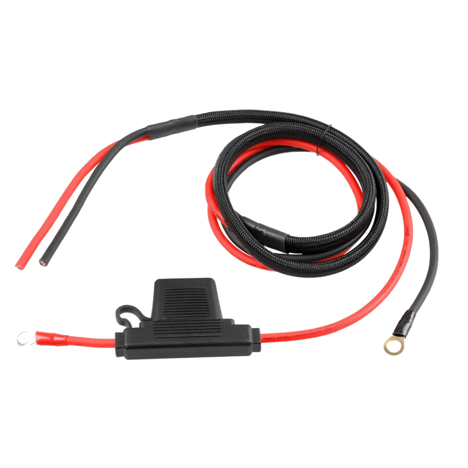 A coiled black and red power cable with a protective cover for a Harley Davidson harness kit includes a ridged cylindrical black component at one end and two metal ring terminals at the other, perfect for robust electrical connections with the CWHK - RPM Harley Davidson Power/Ground Remote Harness Kit.