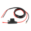 A coiled black and red power cable with a protective cover for a Harley Davidson harness kit includes a ridged cylindrical black component at one end and two metal ring terminals at the other, perfect for robust electrical connections with the CWHK - RPM Harley Davidson Power/Ground Remote Harness Kit.