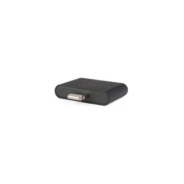 The DIZ | IOS LIGHTNING TRANSMITTER - PL5564 is a compact, black, rectangular adapter with a USB-C male connector. It features SKAA technology for seamless wireless audio connectivity, set against a plain white background to highlight its simplicity and functionality.