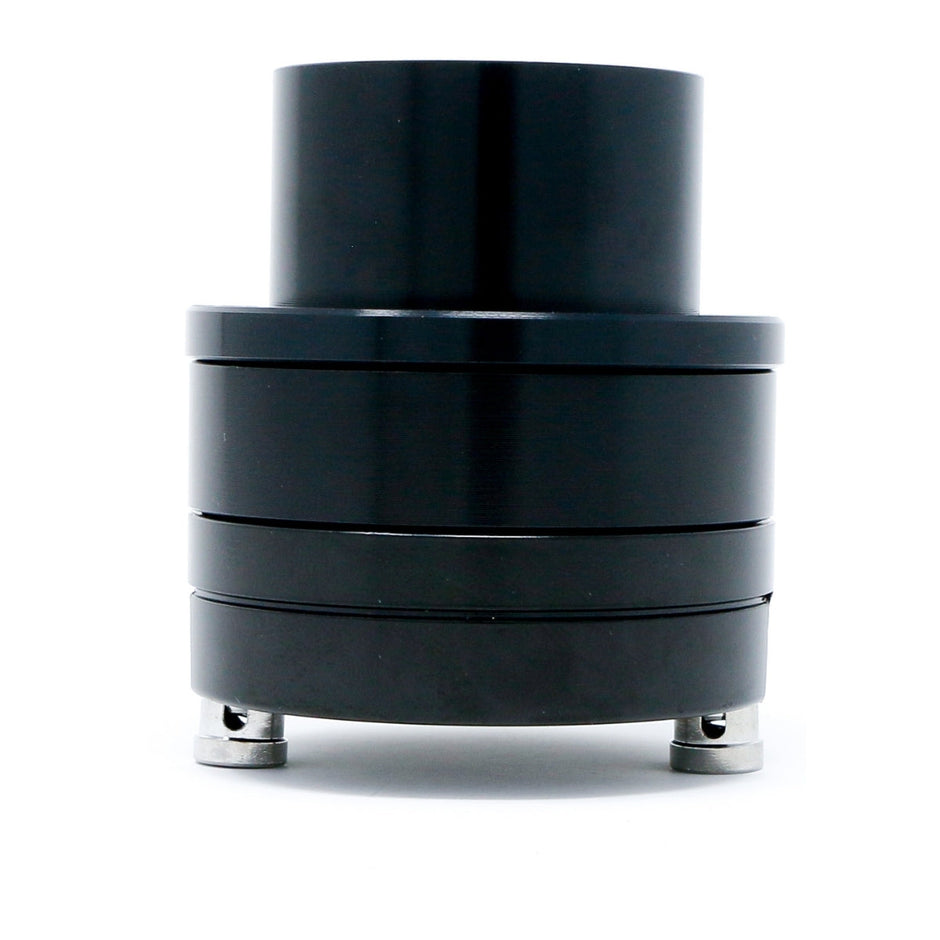 A cylindrical black mechanical component with smooth, shiny surfaces and multiple stacked sections resembles the design of CERWIN-VEGA MOBILE's Pro Series 1