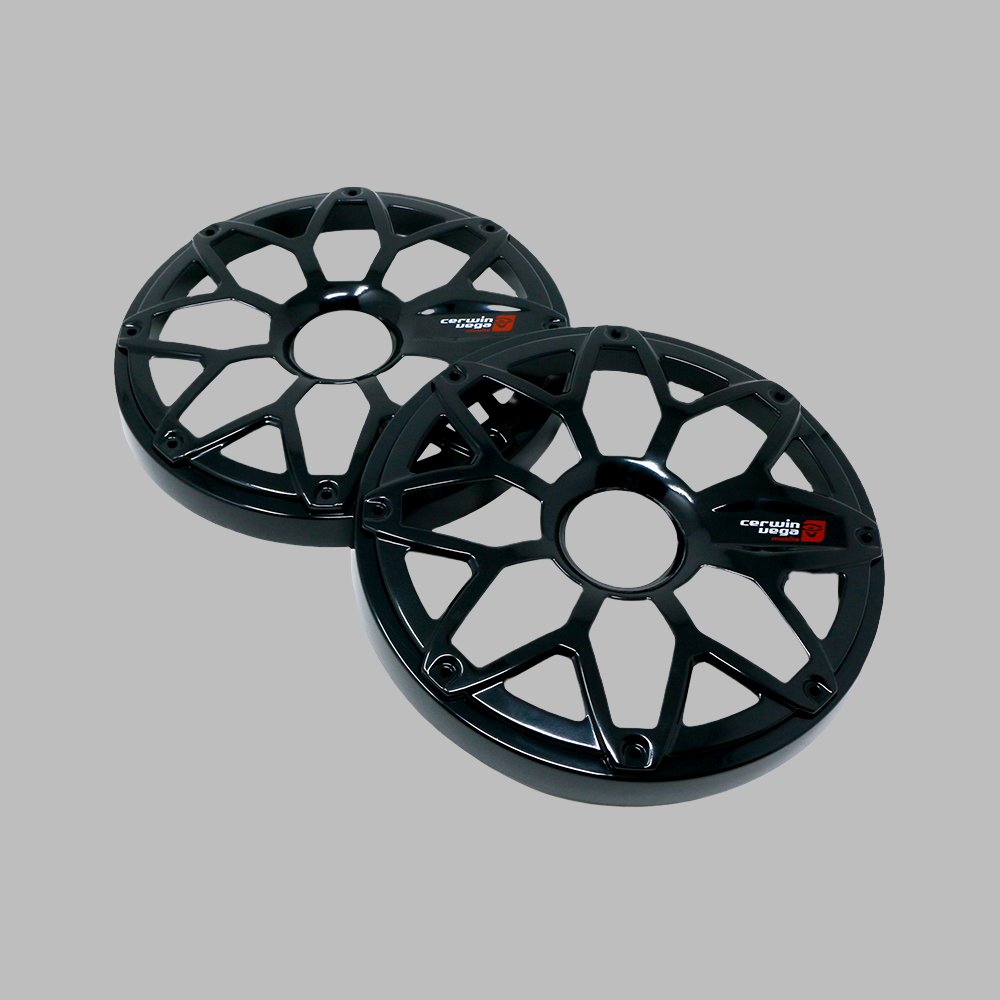 Two black car wheel center caps with a multi-spoke design sit against a gray background, featuring a 