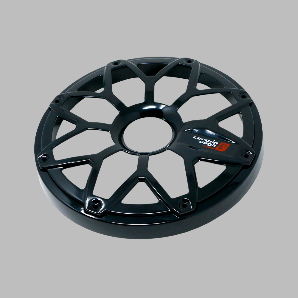 A black circular bike wheel cover with an intricate geometric cutout design resembles an RPM Stroker 6.5