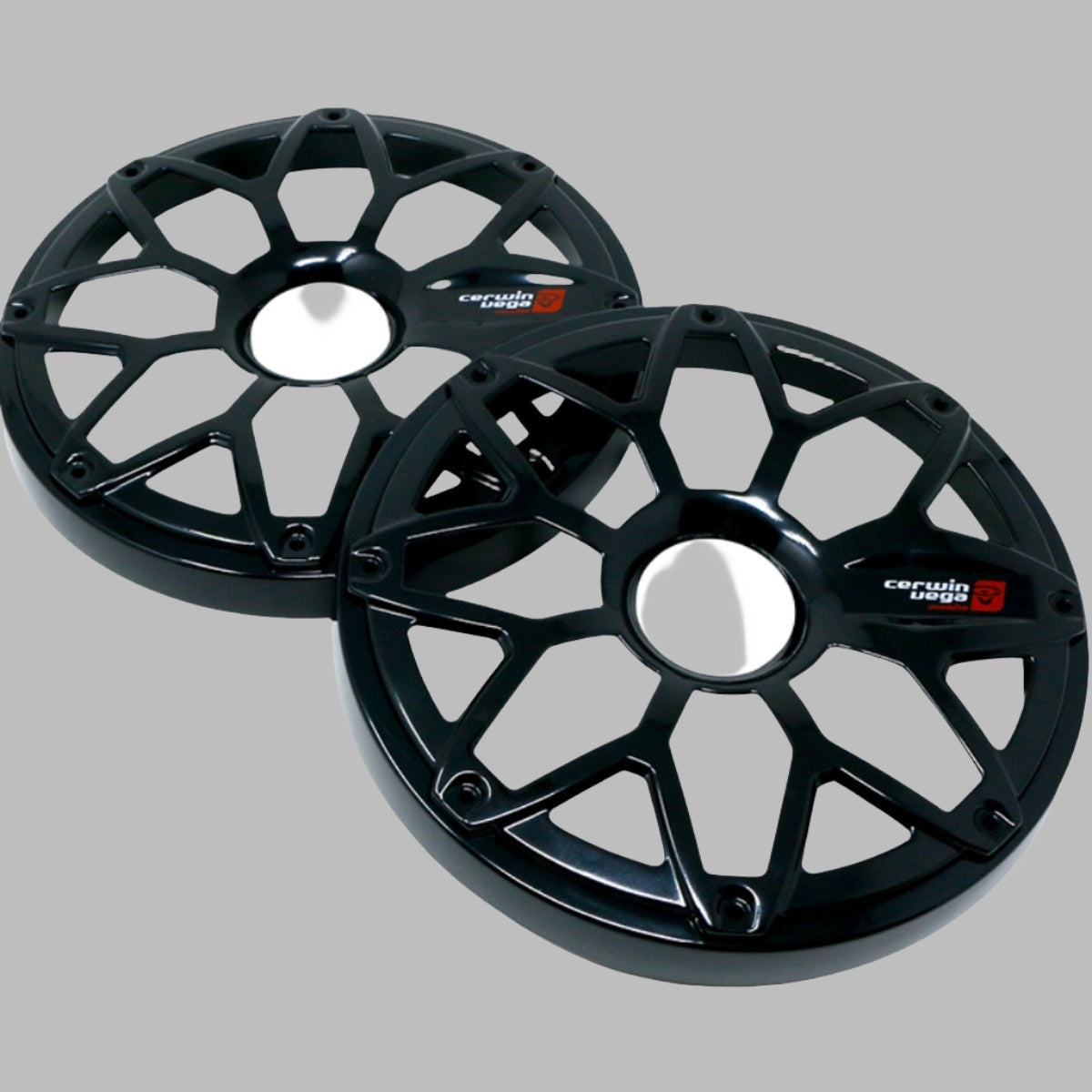 Two glossy black wheel covers with a geometric, multi-spoke design lay on a light gray background. The RPM STROKER finish features small red and silver emblems on the hubcaps, reflecting the precision of an RPM Stroker 8” Flush Mount Speaker Grill pair.