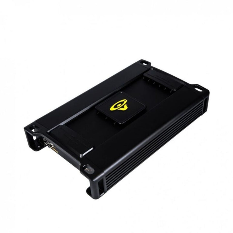 The Stroker Pro Amplifier is a sleek, black rectangular device with finned sides for cooling. It features a yellow logo on the top panel, corner brackets for mounting, and visible side connection ports, all set against a plain white background.