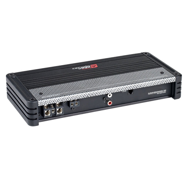 The SRPM Stroker 1-Channel Monoblock Class-D Amplifier - SRPM1000.1D has a compact black and gray rectangular design with digital topology, a metal grid pattern, side connection ports, speaker and power terminals, visible top branding, and rounded reinforced edges for durability.