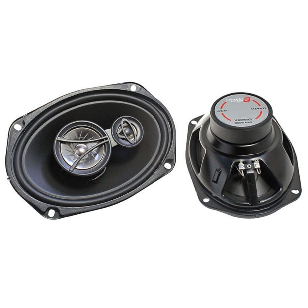 The XED Series 6"x 9" 3-Way Coaxial Speakers - XED693 exhibit superior design: the left oval speaker highlights a silver grille and visible components like a tweeter for top-notch sound, while the right speaker showcases its black casing with connection terminals and specifications.